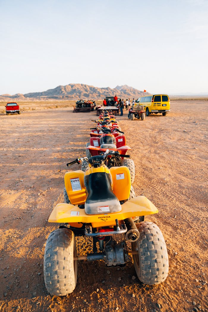 about-01 A lineup of ATVs in the Las Vegas desert awaits an off-road adventure tour.