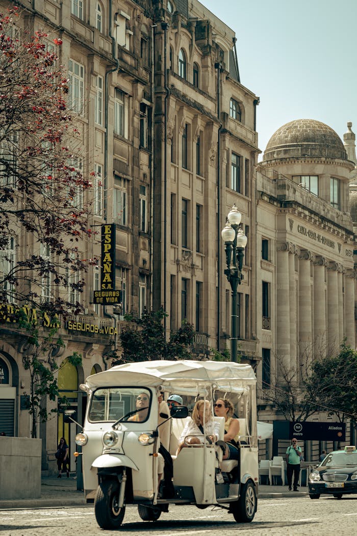 gallery-1 Tuk-tuk tour in a historic city with classic architecture and vibrant street atmosphere.